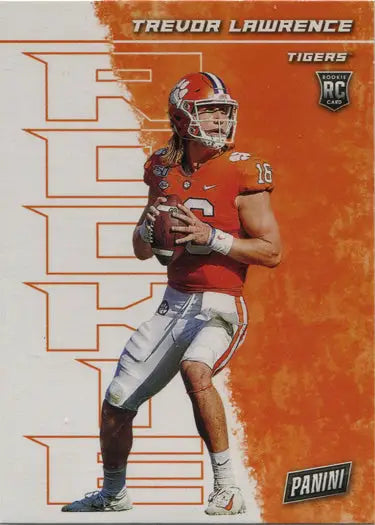 Football trading card featuring Trevor Lawrence in an orange jersey ready to throw a pass