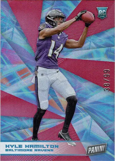 Football player in a purple jersey catching a ball for Red Foil Parallel Card