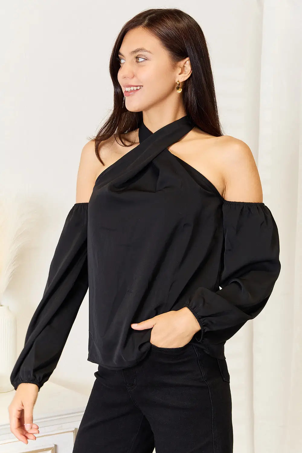 Black Perfee Grecian Cold Shoulder blouse with long sleeves and off-the-shoulder design
