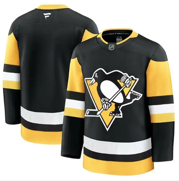 Black, yellow, and white Pittsburgh Penguins away premium hockey jersey displayed
