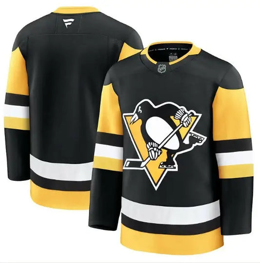 Black, yellow, and white Pittsburgh Penguins away premium hockey jersey displayed