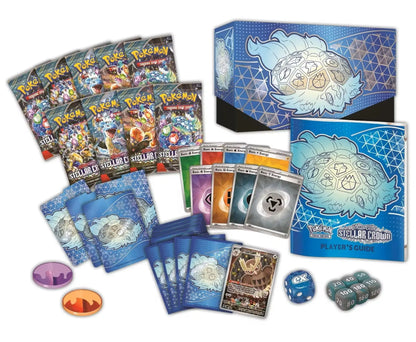 Collection of Pokémon trading cards, sleeves, and energy tokens from Stellar Crown set