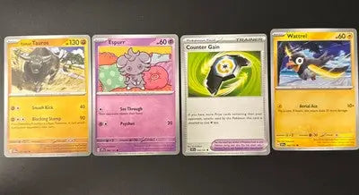 Four Pokémon trading cards from Surging Sparks Lot of 12 Cards collection