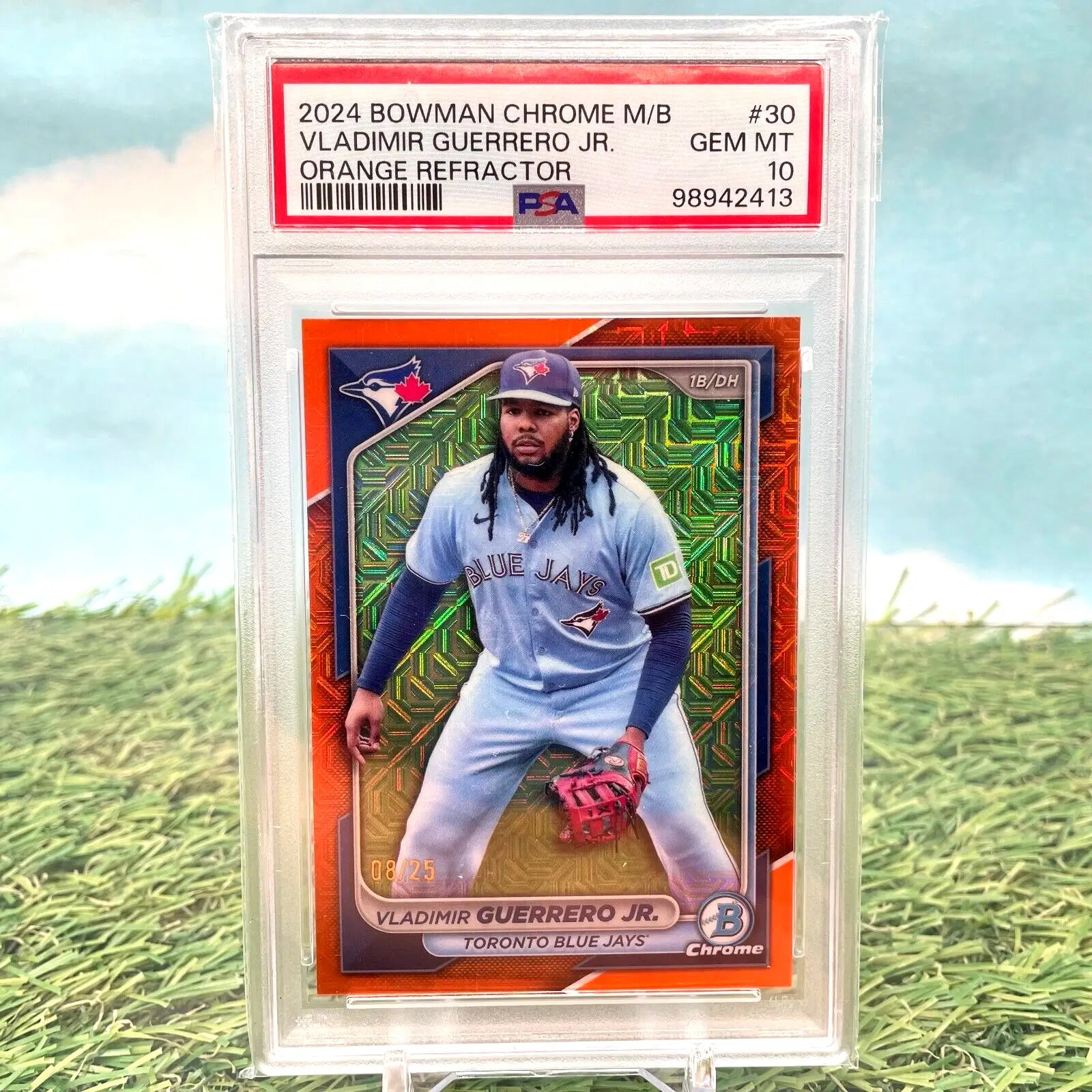 Graded Vladimir Guerrero Jr. baseball card featuring orange refractor from Bowman Chrome 2024