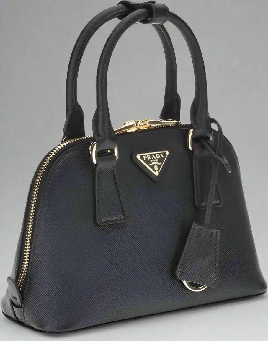 Prada black leather dome handbag with gold hardware for stylish black leather accessory