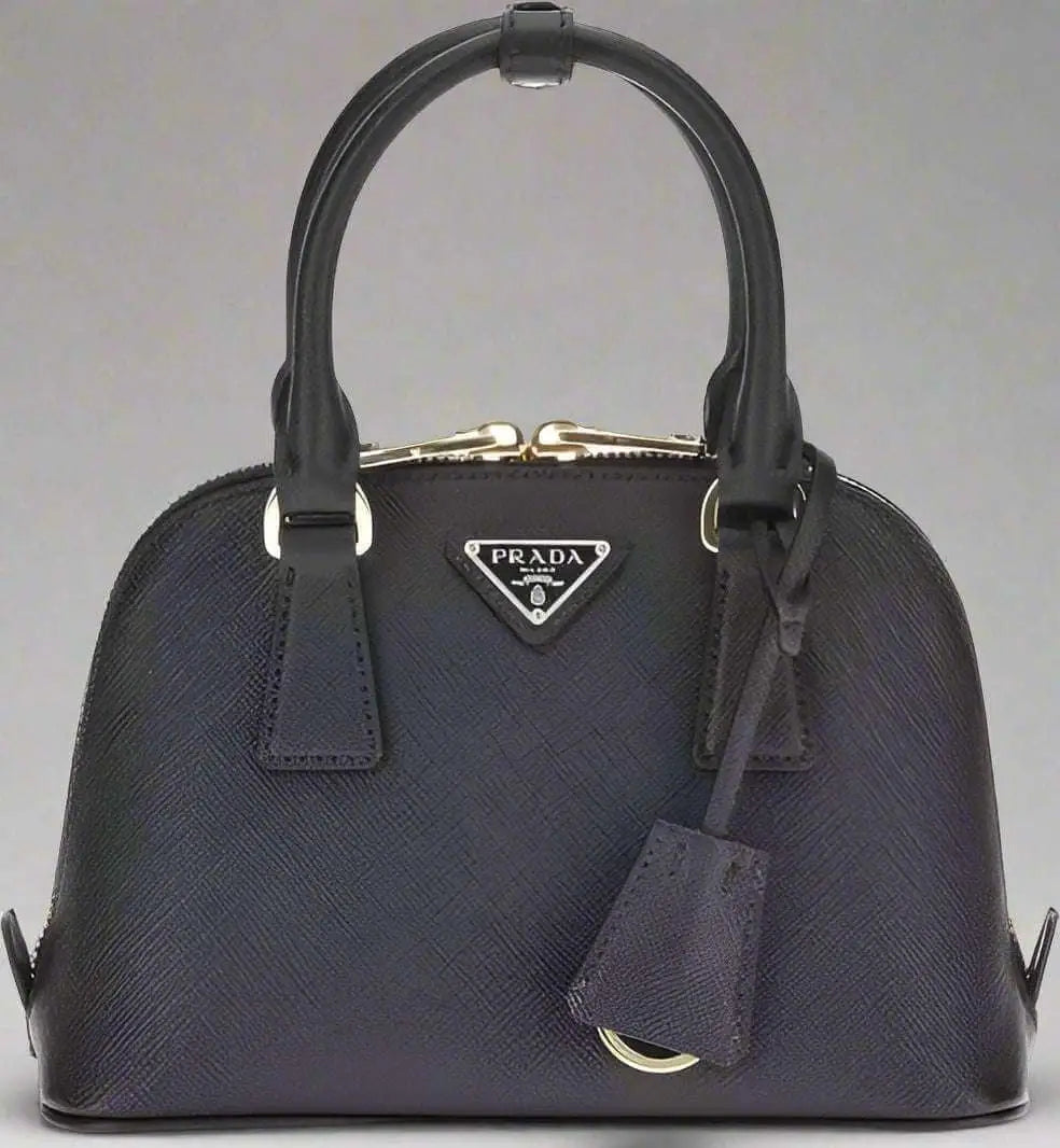 Prada black leather handbag with top handles and key clochette for elegant style
