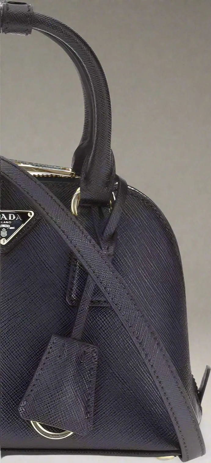Prada black leather logoed handbag with top handle and detachable shoulder strap