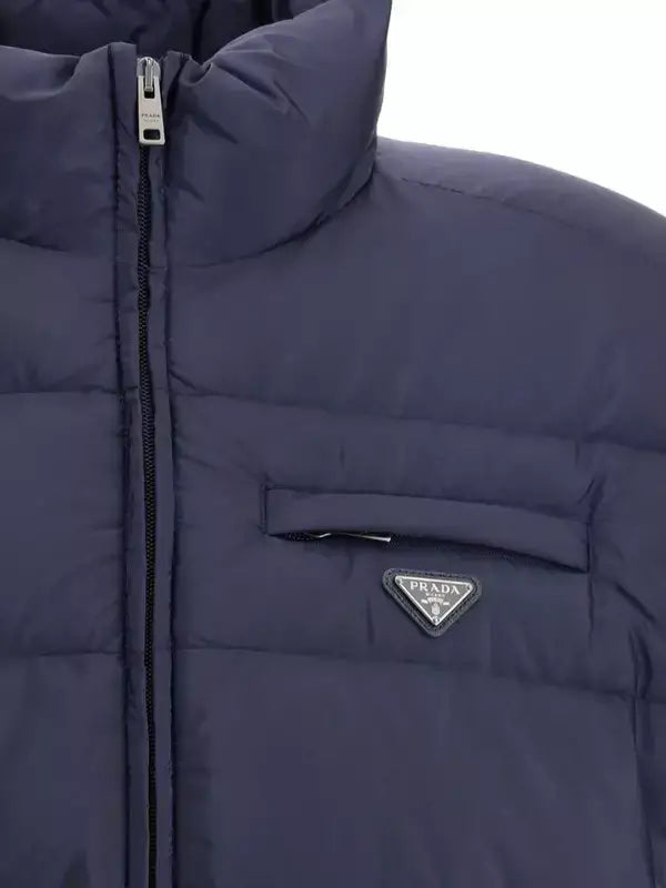PRADA Men’s Navy Re-Nylon Down Jacket with quilted design and triangular plaque