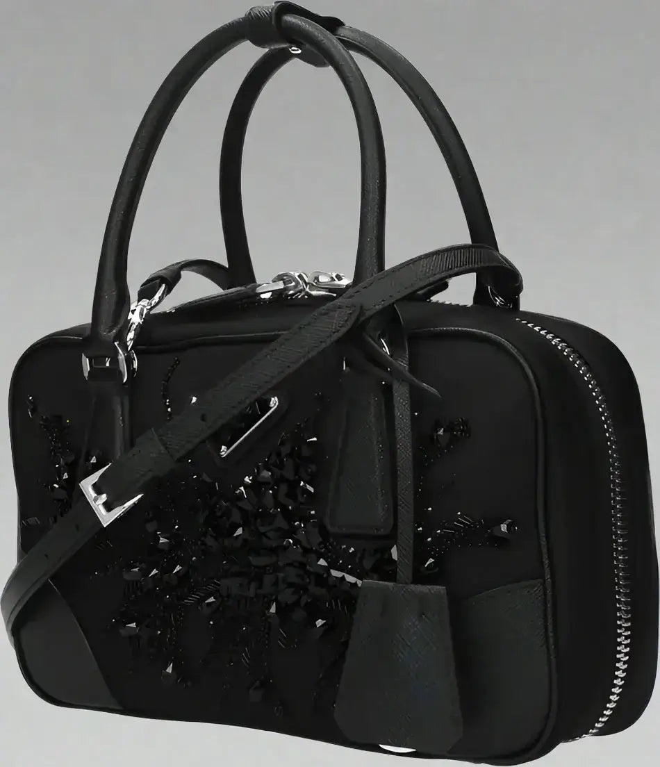 PRADA women’s Black fabric handbag with embellished leather, top handles, and shoulder strap