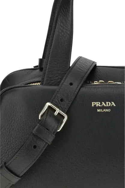 Black leather Prada handbag with silver buckle and shoulder strap for women
