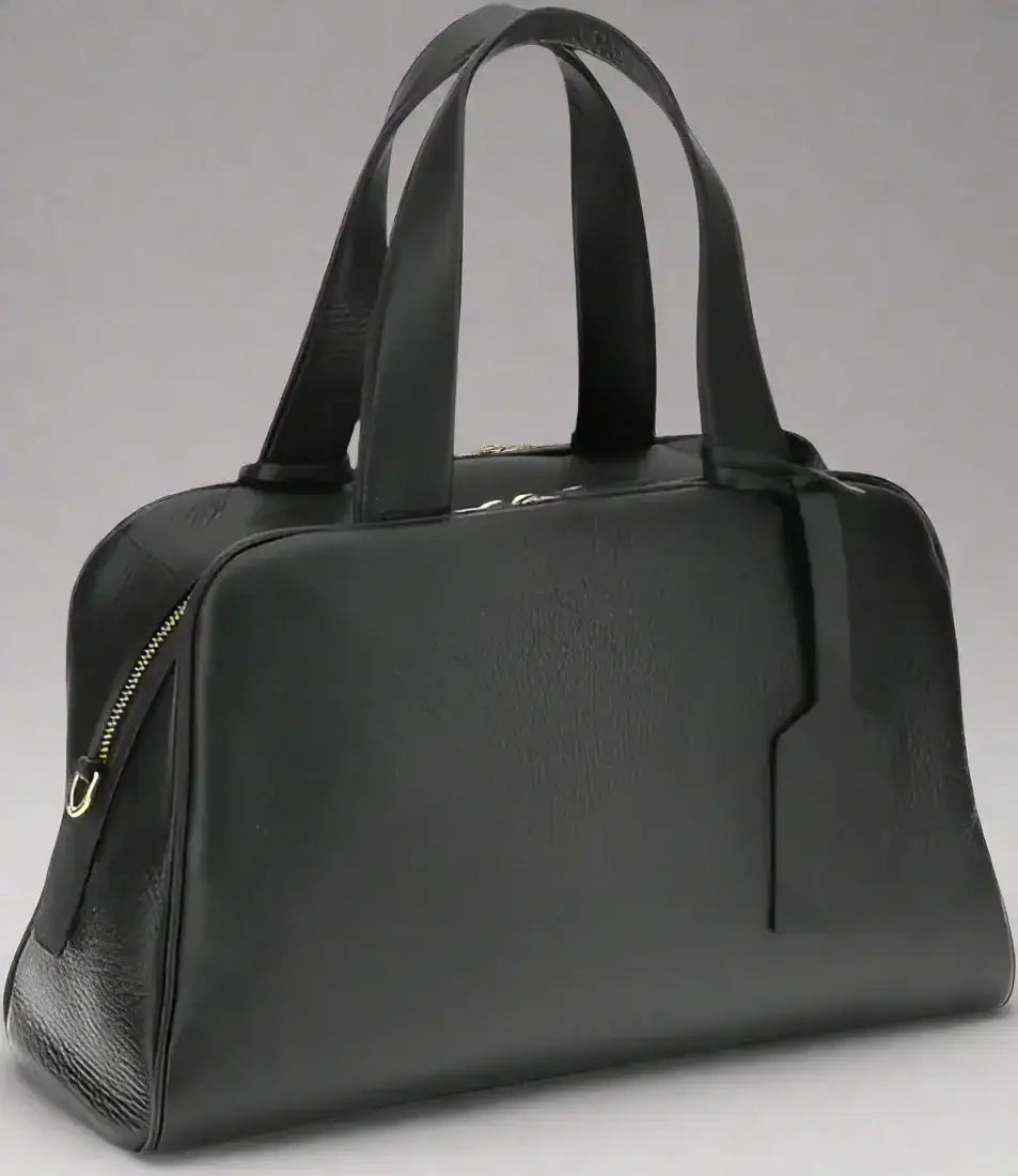 Dark gray leather handbag with top handles, zip pocket, and luggage tag for PRADA women