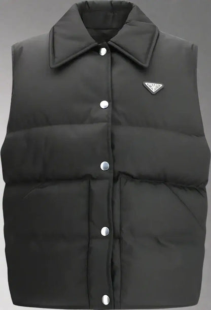 Black sleeveless puffer vest with pointed collar and silver snap buttons for PRADA women