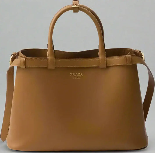 Tan leather Prada handbag with top handles and shoulder strap for women