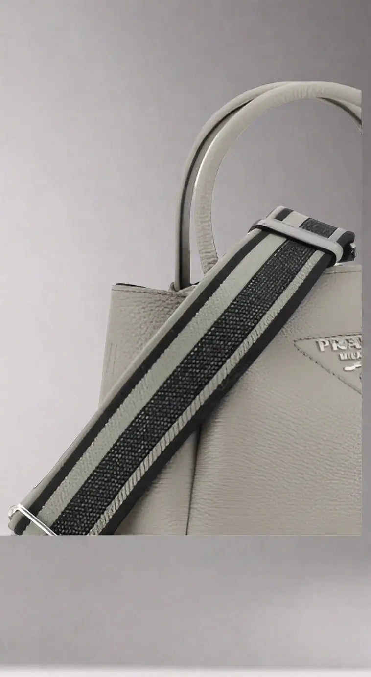 PRADA women’s grey grained leather handbag with striped fabric strap for stylish accessories
