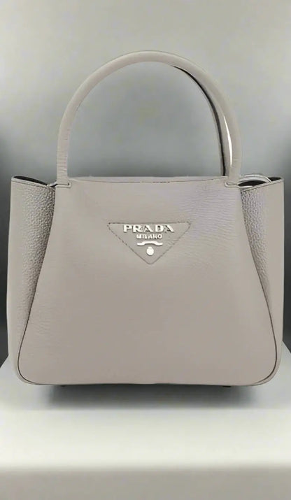 Light grey grained leather handbag with top handle for PRADA women’s GRAINED HANDBAG