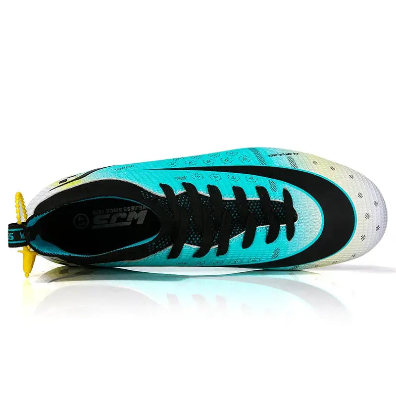 Vibrant turquoise and black athletic soccer shoe with yellow pull tab, decorate root style, 750px width 750px height