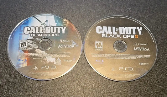 Two used Call of Duty game discs for PS3 in Duty Lot Black Ops 1 and 2