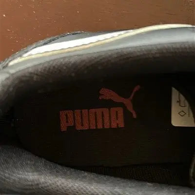 Black Puma Rendon Move men’s sneaker with synthetic leather upper and rubber outsole