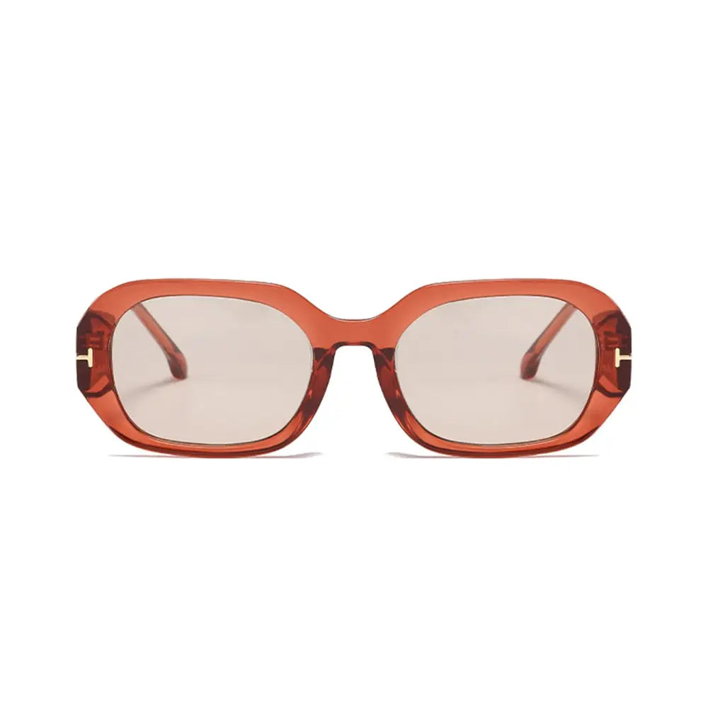Moma Orange Champagne sunglasses with translucent orange rectangular frames and light brown lenses