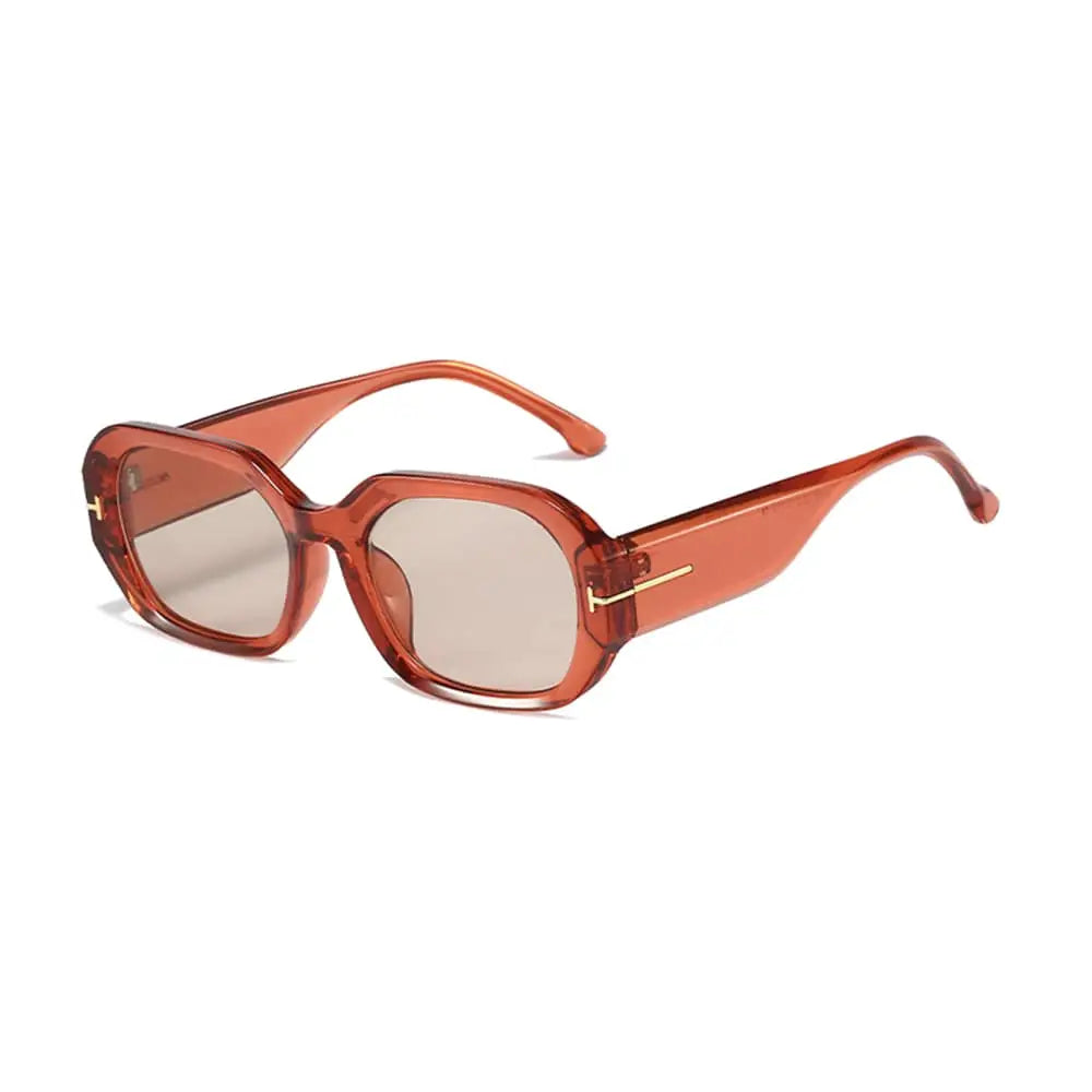 Translucent reddish-brown Moma Orange Champagne sunglasses with light brown lenses and gold accents