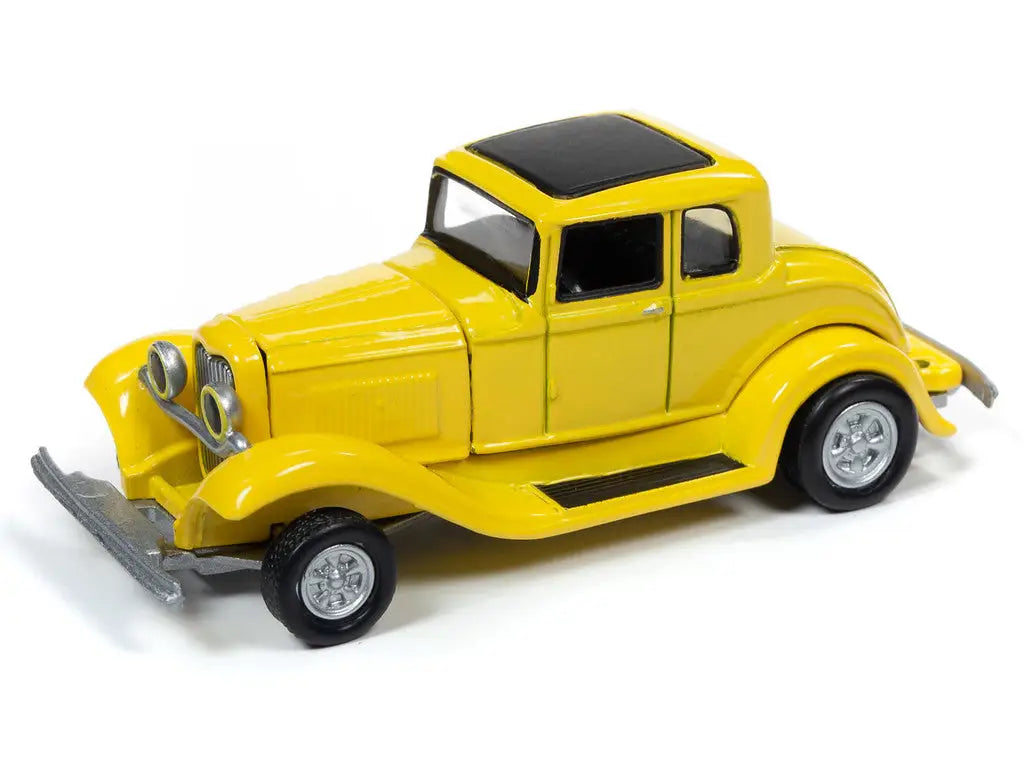 Yellow vintage toy car model resembling a 1930s Ford Coupe from Racing Champions Mint RC010