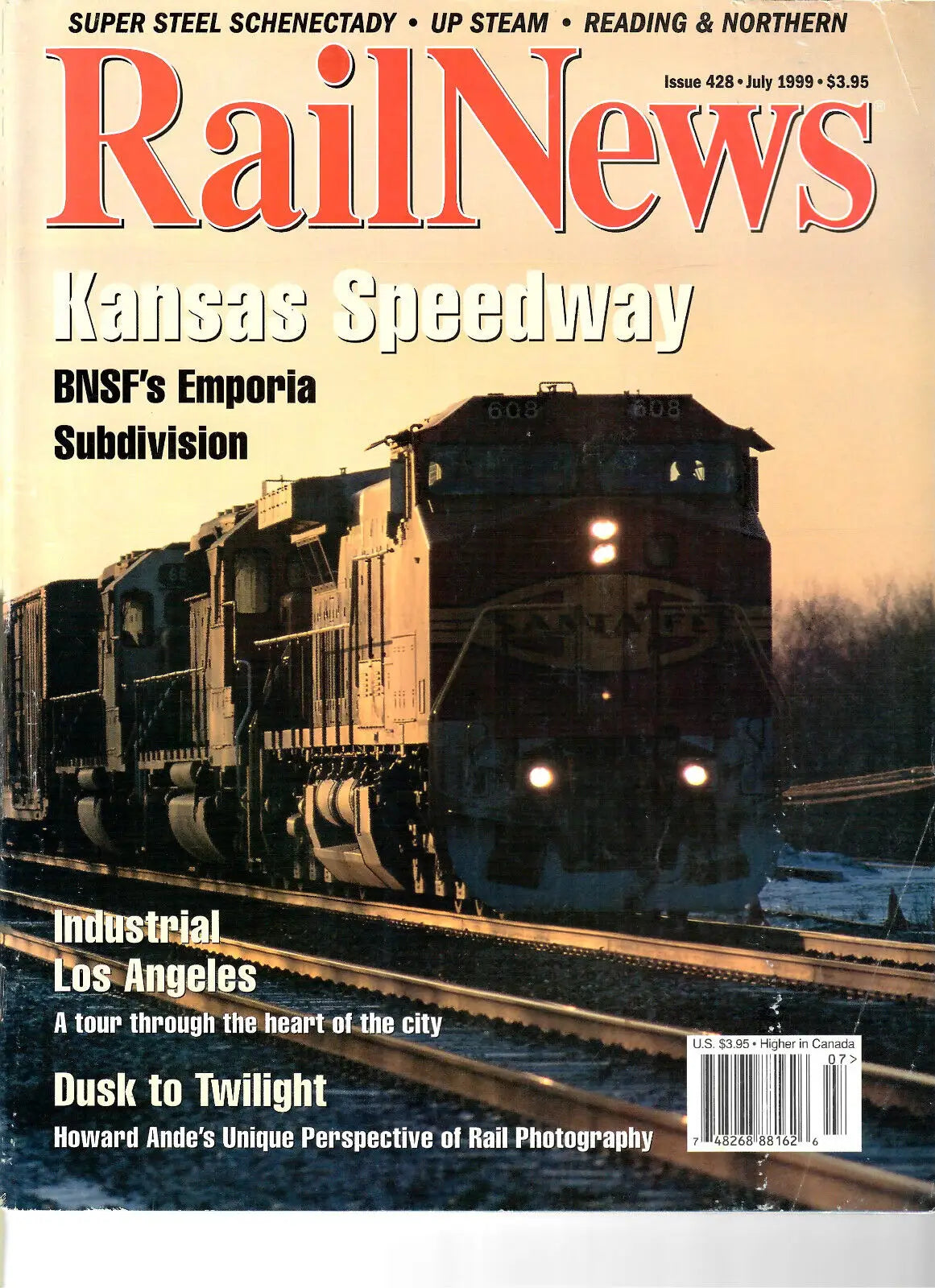 RailNews #428 magazine cover featuring Kansas Speedway at dusk, ideal for trading cards collectors