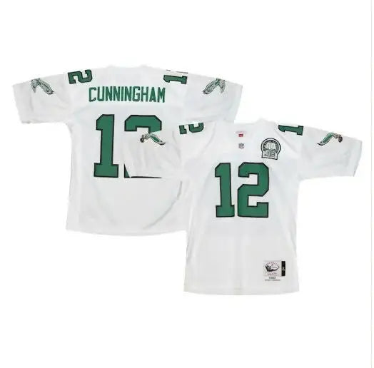 Two white Philadelphia Eagles jerseys with green numbers and lettering featuring Randall Cunningham 1992 design