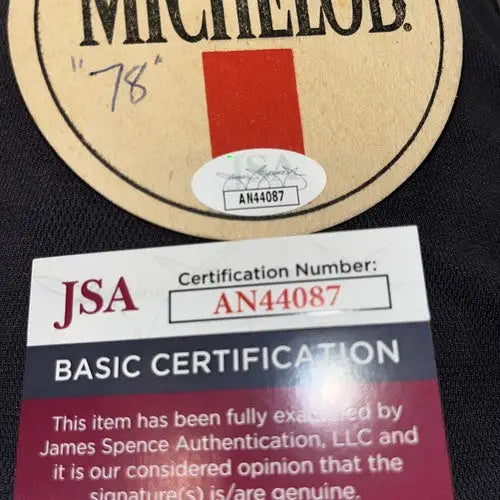 JSA-certified signed Michelob beer coaster featuring Randy Holt autograph with certification number AN44087