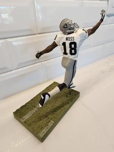 Randy Moss Rare McFarlane action figure displayed as a Raiders collectible figurine