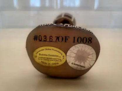 Brown bobblehead duck featuring autographed Chuck Foreman with limited edition #367/1008