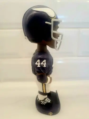 Autographed Chuck Foreman Minnesota Vikings bobblehead, a rare collectible item