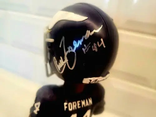 Autographed Chuck Foreman Minnesota Vikings bobblehead, rare collectible item