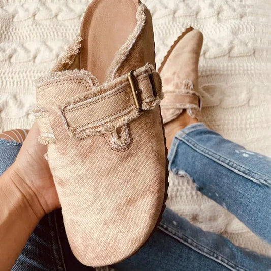 Light brown RetroCharm Canvas Loafer Clogs with distressed edges and buckled strap