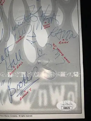 Autographed wrestling poster featuring Ric Flair and Arn Anderson signed flyer for WWE WCW