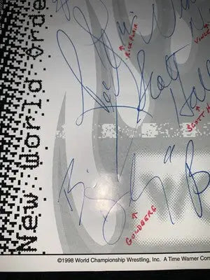 Signed flyer featuring Ric Flair and Arn Anderson from WWE NWO WCW JSA Auto