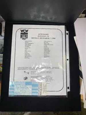 Signed flyer featuring Ric Flair and Arn Anderson from WCW Nitro event program