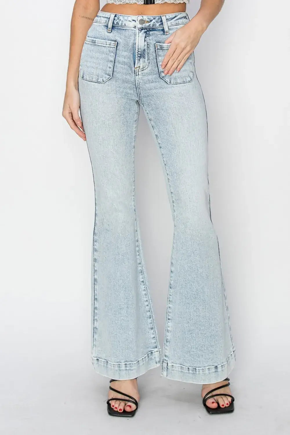 Light wash high-rise patch pocket flare jeans from Risen with front patch pockets