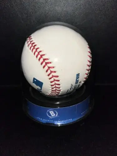 White baseball with red stitching, Roger Clemens Signed Baseball Passed Carlton inscription
