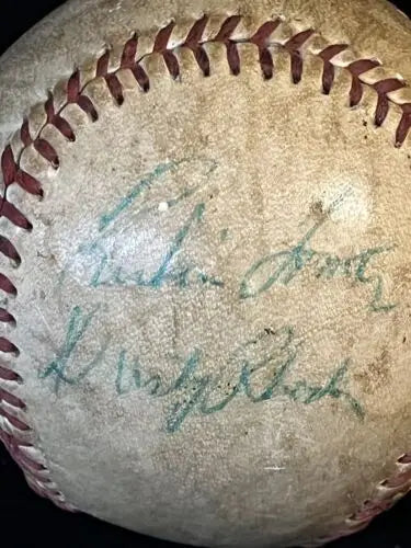 Autographed baseball with faded signatures from Roger Maris and Cleveland Indians players