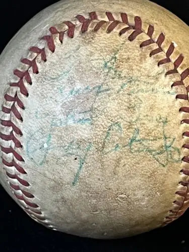Autographed baseball with red stitching featuring Roger Maris from Cleveland Indians