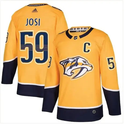 Yellow and navy Nashville Predators hockey jersey with JOSI 59 and captain C logo