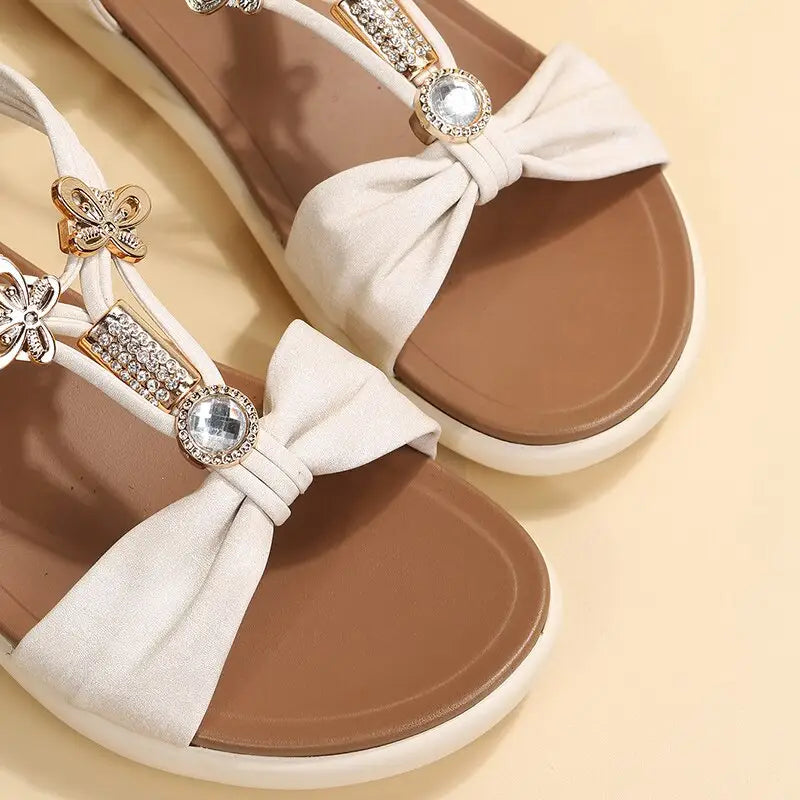 Roman Style Flat Sandals with bows and rhinestone embellishments for stylish summer wear