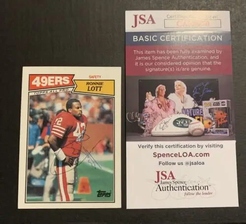 Signed Ronnie Lott trading card with JSA certification in 1987 Topps #123 design