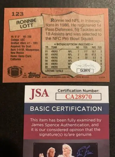 Autographed Ronnie Lott 1987 Topps trading card with JSA certification for collectors