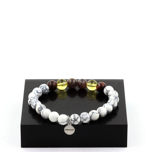 Beaded bracelet with ruby Burma, red tiger’s eye, and citrine beads with silver charm