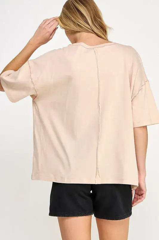 Beige oversized blouse with bell sleeves and button-down front for love-inspired graphic oversized style
