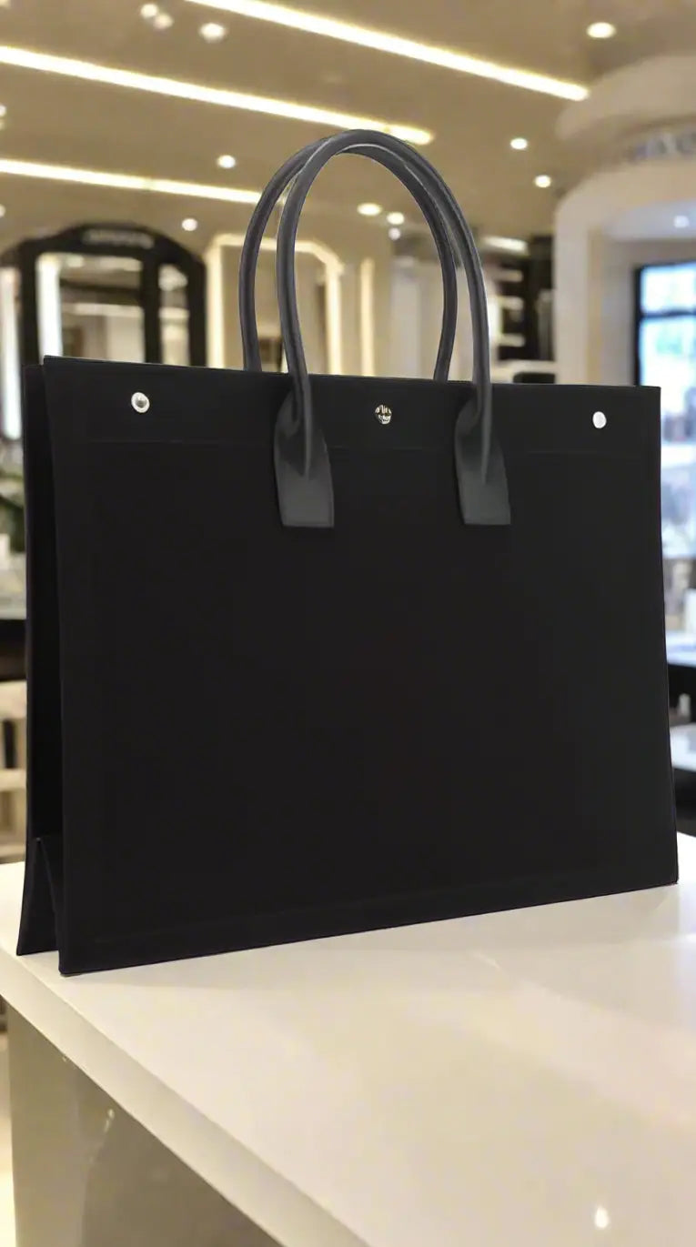 Black rectangular tote bag with top handles from Saint Laurent RIVE GAUCHE collection