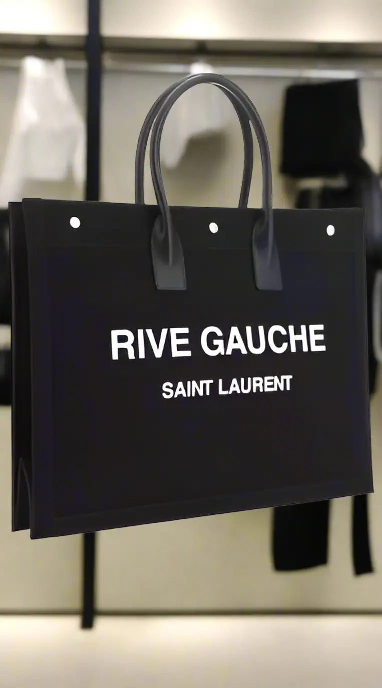 Saint Laurent RIVE GAUCHE black tote bag with dual handles and white grommets