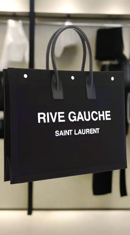 Saint Laurent RIVE GAUCHE black tote bag with dual handles and white grommets