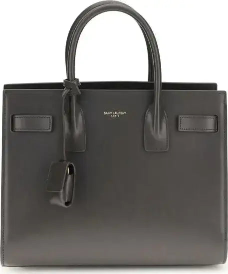 Dark gray leather Saint Laurent Sac De Jour Baby handbag with top handles and clochette